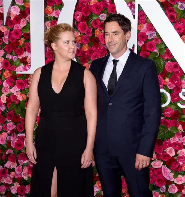 Amy Schumer and Husband Chris Fischer Pack On Major PDA on Oscars 2022 Red Carpet