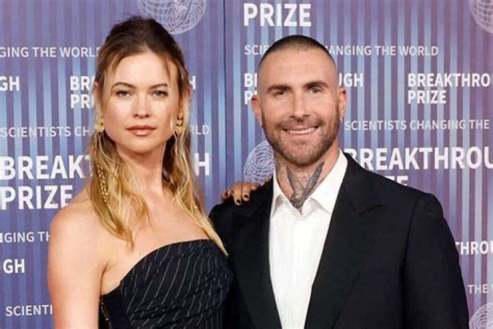 Behati Prinsloo Reflects On Meeting Adam Levine: ‘It Was Love At First Sight’