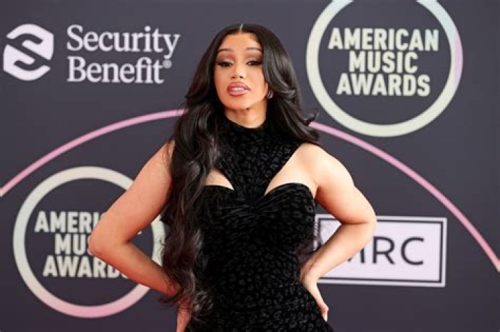 Cardi B Twerks In Bright Red Pants To Match Her Bold New Hair: Video