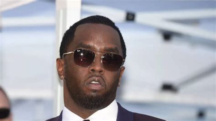 Diddy's Fourth Sexual Assault Accuser Allegedly Sits In His Lap In New Photos