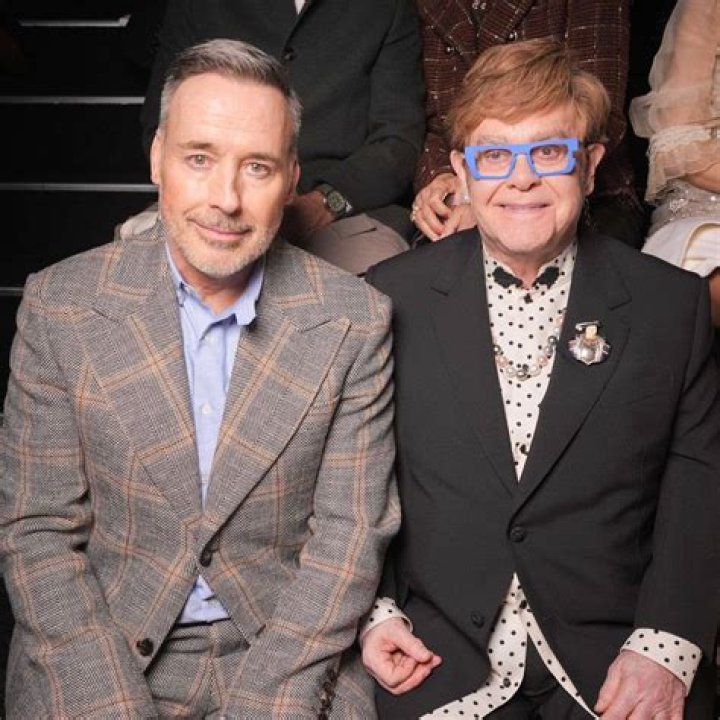 Does Elton John still own a condo in Atlanta?