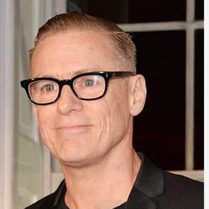 How tall is Brian Adams