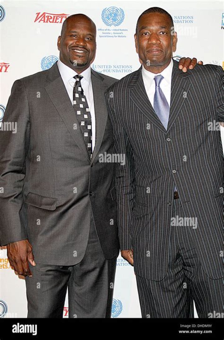 How tall is Dikembe Mutombo