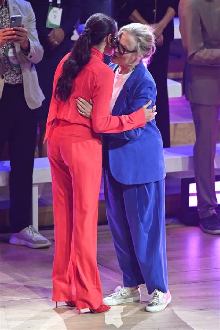 Meghan Markle Wows In Red Pantsuit At Manchester Charity Summit: See Photos of Her Sexy Outfit