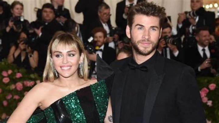 Miley Cyrus and Liam Hemsworth Make Their First Appearance Together as a Married Couple