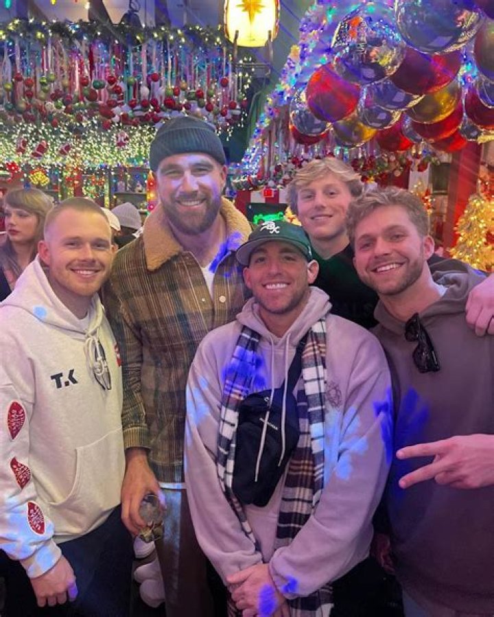 Taylor Swift and Travis Kelce Pack On the PDA as They Enjoy a Post-Game Christmas Party [Photos]
