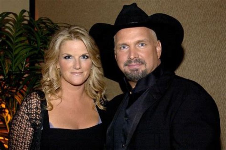 Who is worth more Garth Brooks or Trisha Yearwood?